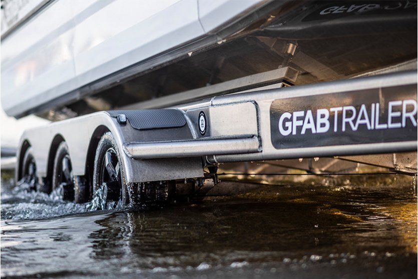 GFAB triple axle alloy trailer coming out of the water.